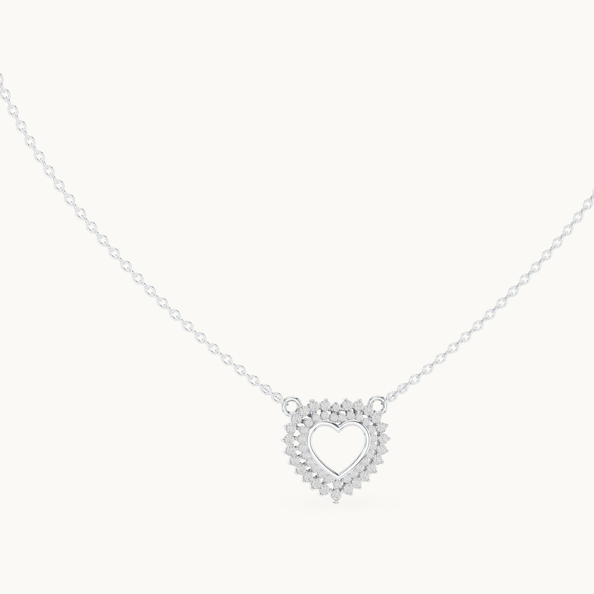 Round lab-grown diamond double halo heart pendant in white gold, 0.38 CT TW, view 1