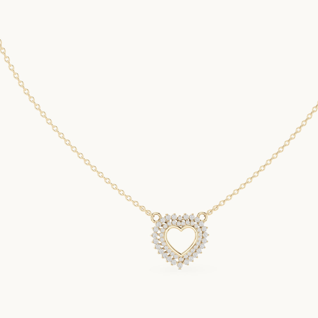 Round lab-grown diamond double halo heart pendant in yellow gold, 0.38 CT TW, view 1