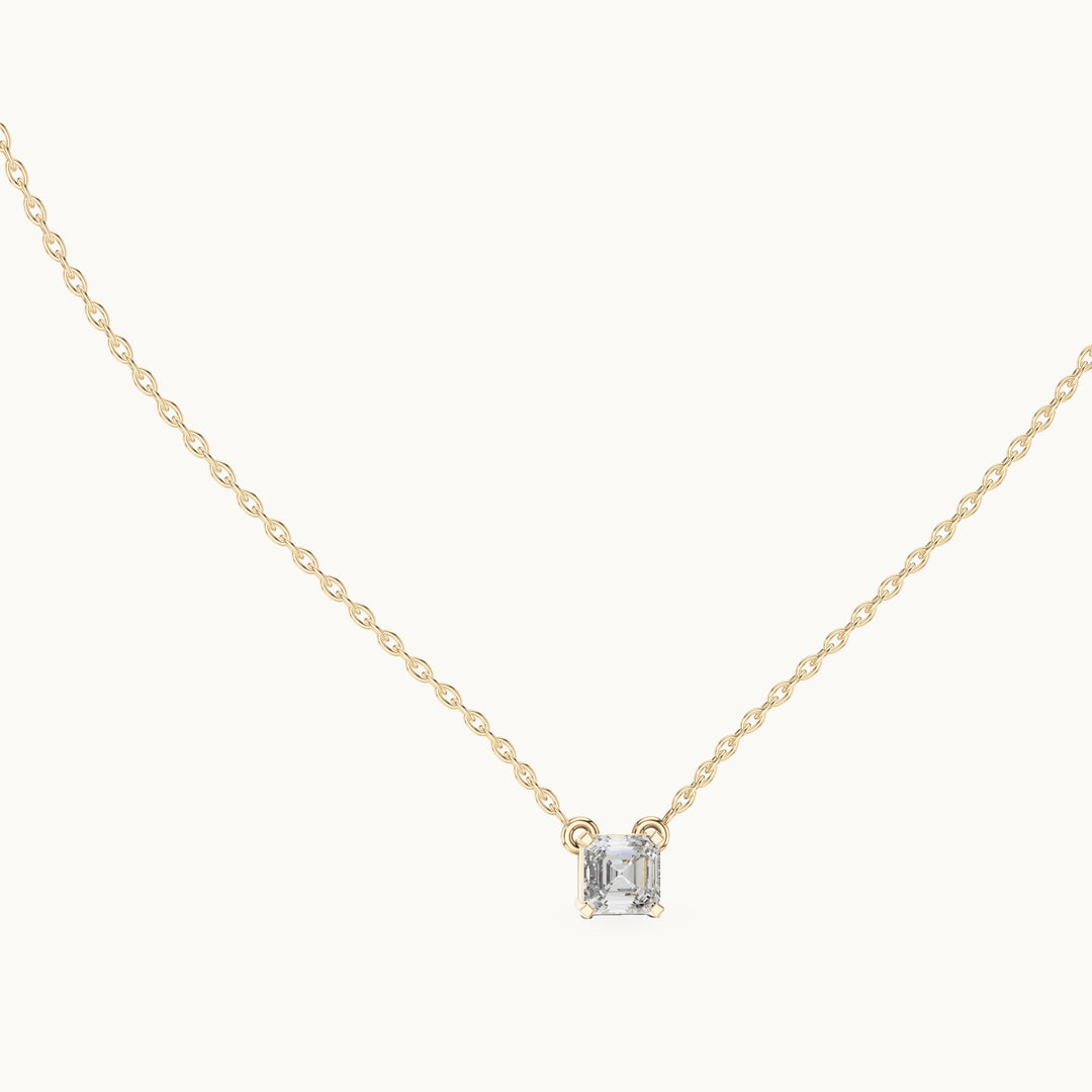 Square emerald-cut lab-grown diamond side-loop solitaire pendant in yellow gold, 0.50 CT TW, view 1