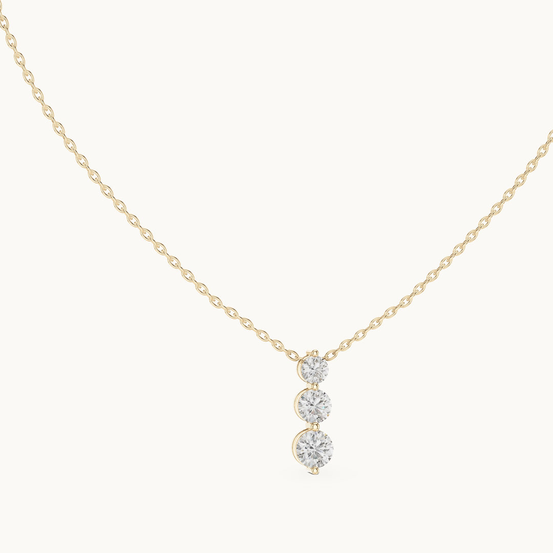 Round lab-grown diamond three-stone drop pendant in yellow gold, 1.11 CT TW, view 1