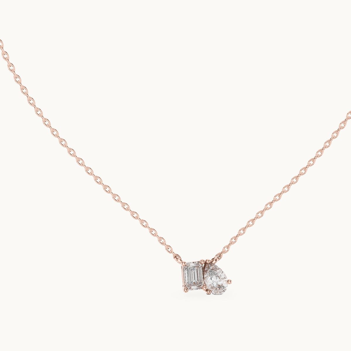 Pear and emerald-cut lab-grown diamond toi et moi pendant in rose gold, 0.96 CT TW, view 1