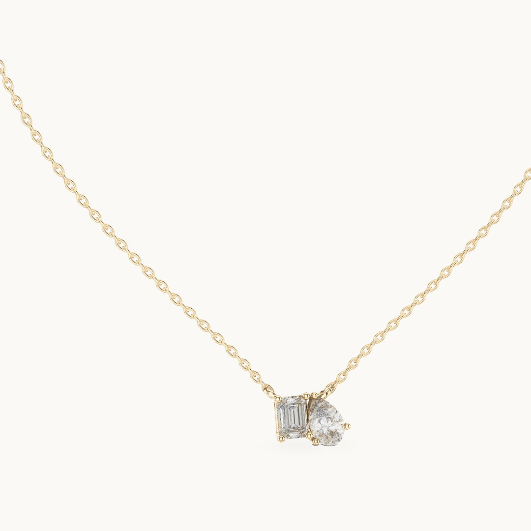 Pear and emerald-cut lab-grown diamond toi et moi pendant in yellow gold, 0.96 CT TW, view 1