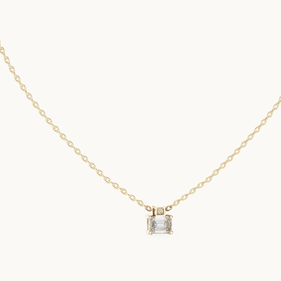 Emerald-cut lab-grown diamond east-west solitaire pendant in yellow gold, 0.39 CT TW, view 1
