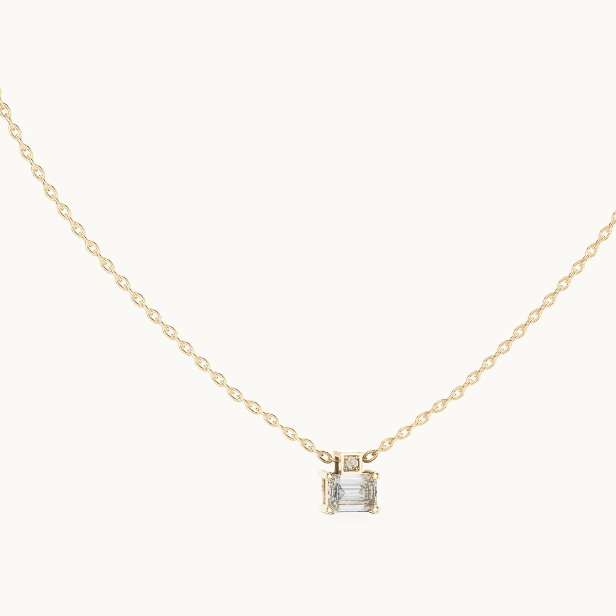 Emerald-cut lab-grown diamond east-west solitaire pendant in yellow gold, 0.39 CT TW, view 1