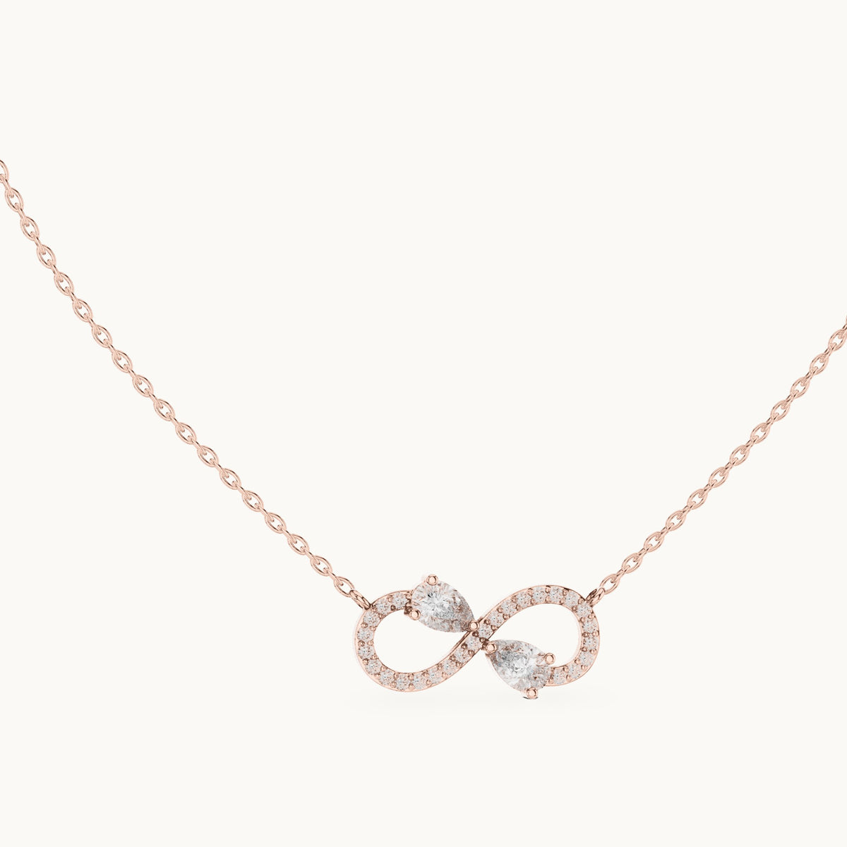 Pear and round lab-grown diamond infinity pendant in rose gold, 0.70 CT TW, view 1