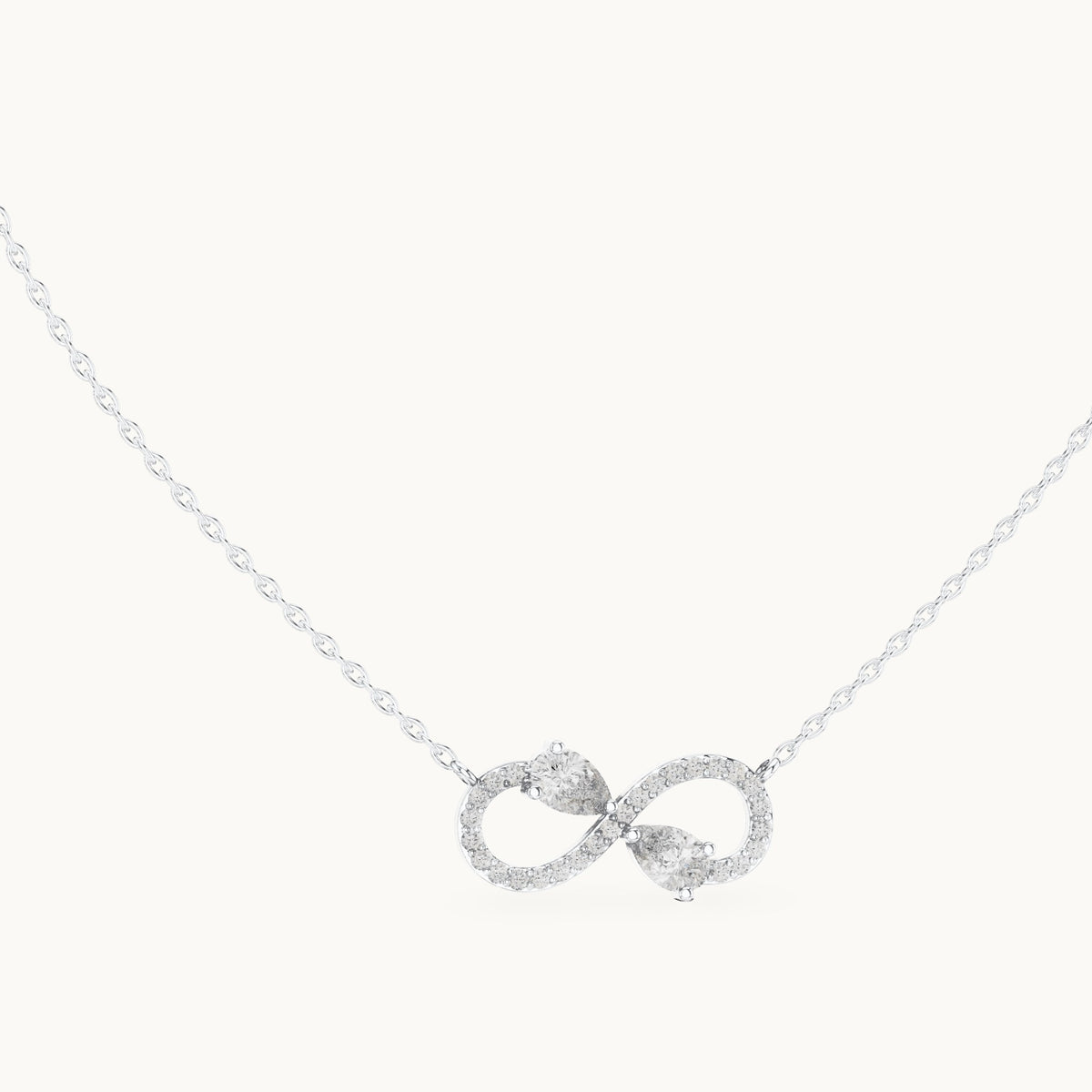 Pear and round lab-grown diamond infinity pendant in white gold, 0.70 CT TW, view 1