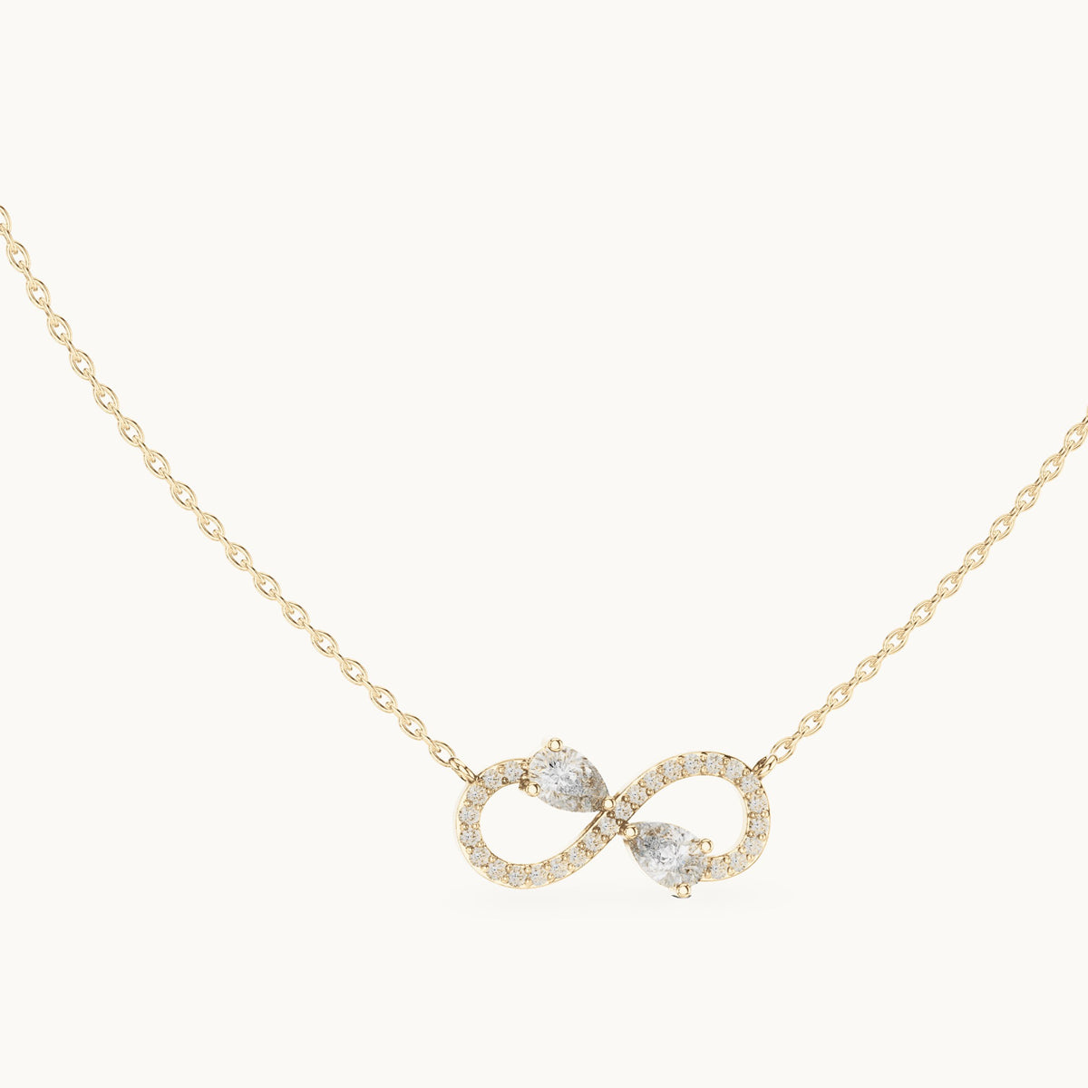 Pear and round lab-grown diamond infinity pendant in yellow gold, 0.70 CT TW, view 1