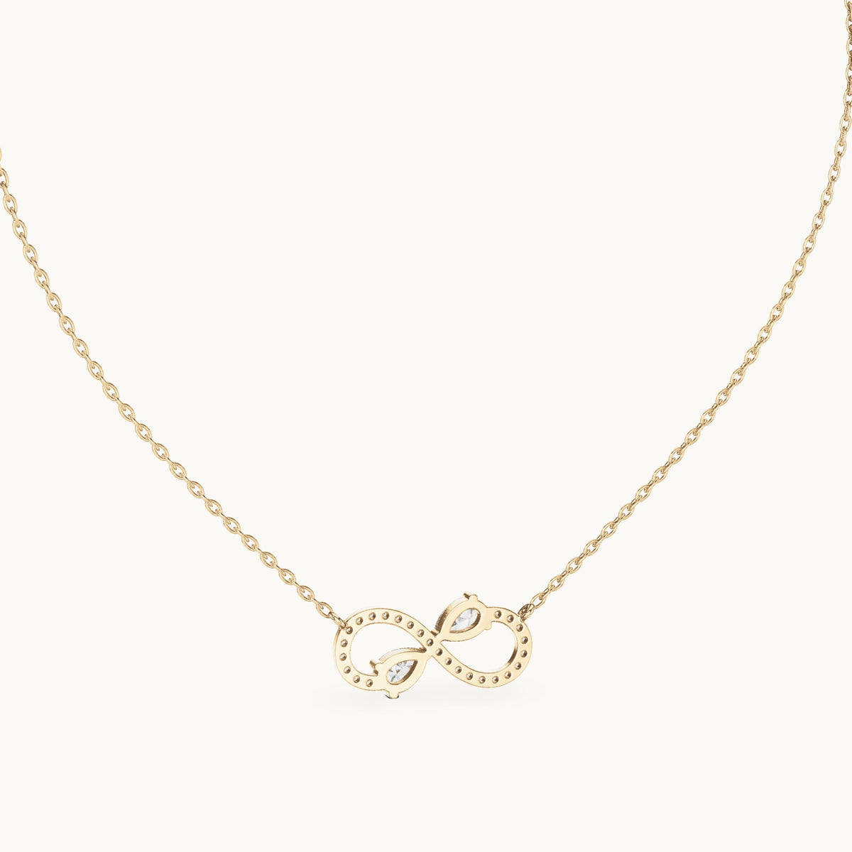 Pear and round lab-grown diamond infinity pendant in yellow gold, 0.70 CT TW, view 4