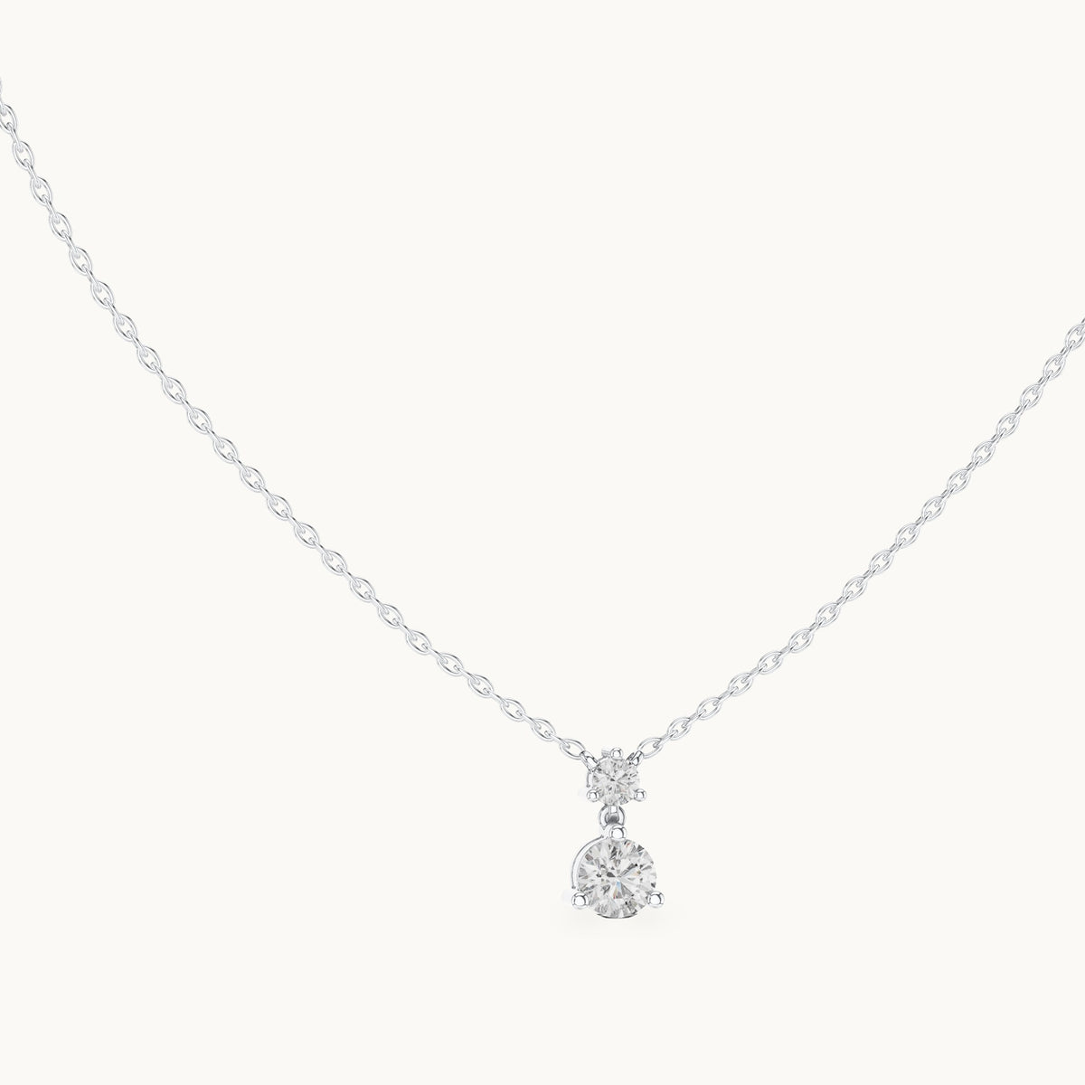 Round lab-grown diamond two-stone drop pendant in white gold, 0.61 CT TW, view 1