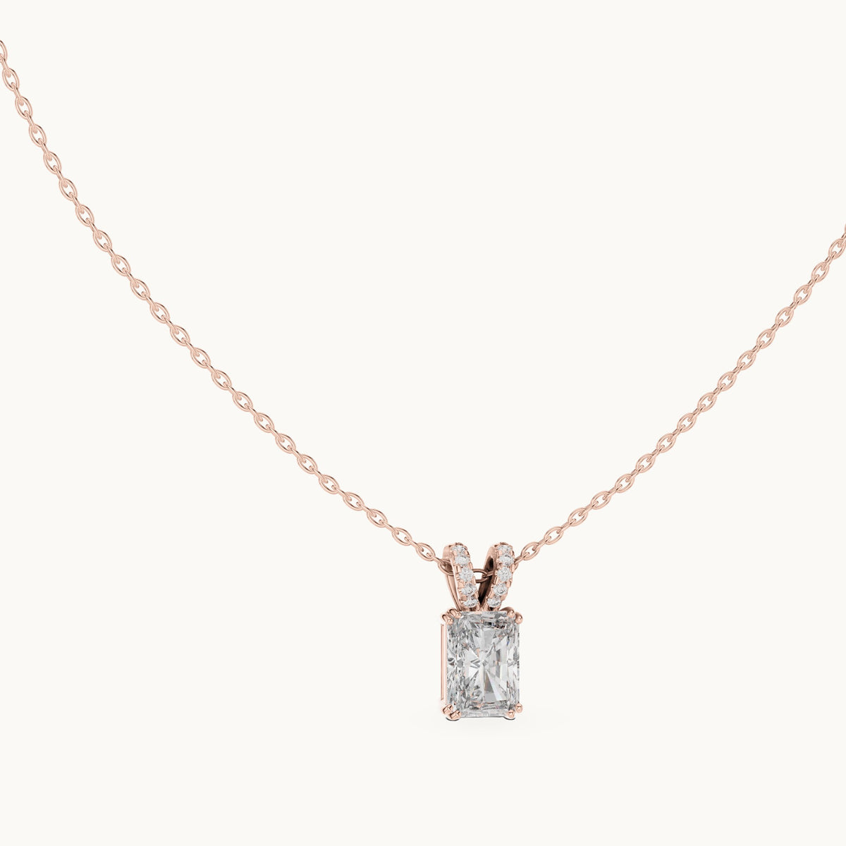 Radiant-cut and round lab-grown diamond solitaire pendant with pave bail in rose gold, 2.137 CT TW, view 1