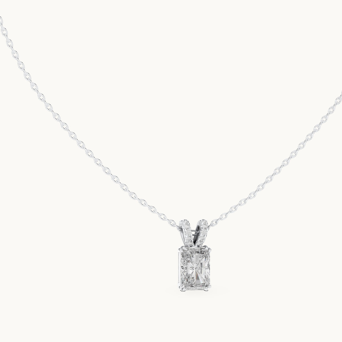 Radiant-cut and round lab-grown diamond solitaire pendant with pave bail in white gold, 2.137 CT TW, view 1