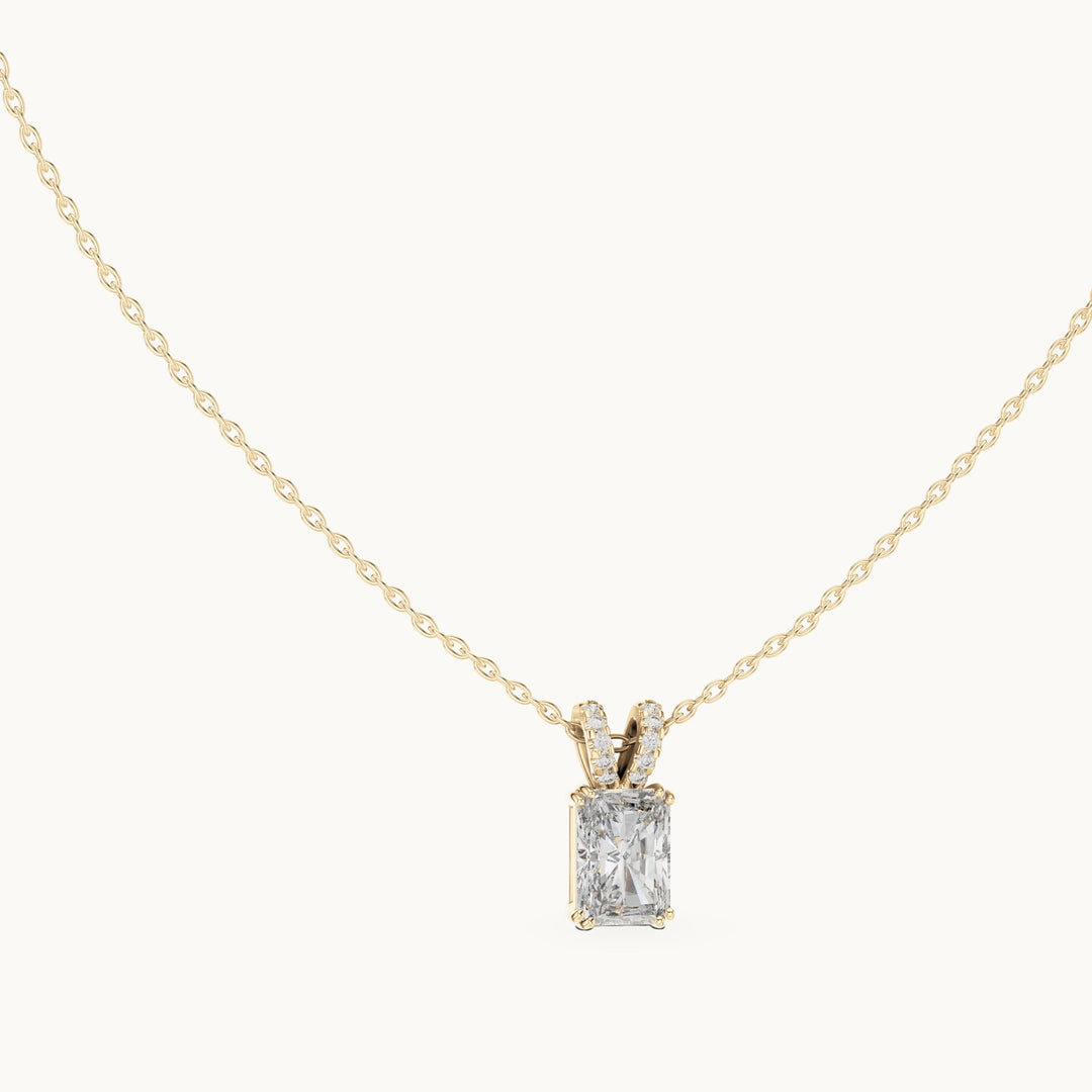 Radiant-cut and round lab-grown diamond solitaire pendant with pave bail in yellow gold, 2.137 CT TW, view 1