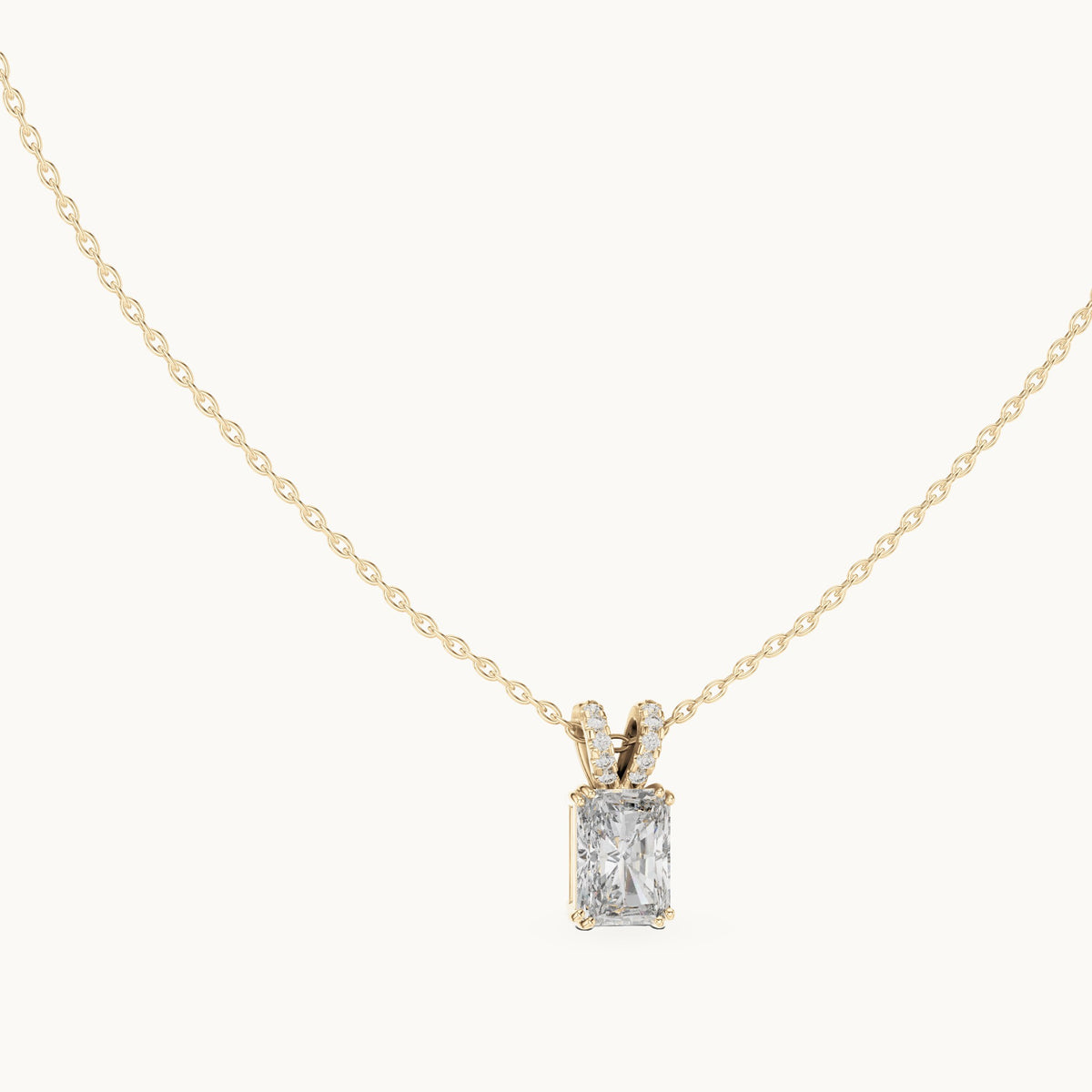 Radiant-cut and round lab-grown diamond solitaire pendant with pave bail in yellow gold, 2.137 CT TW, view 1