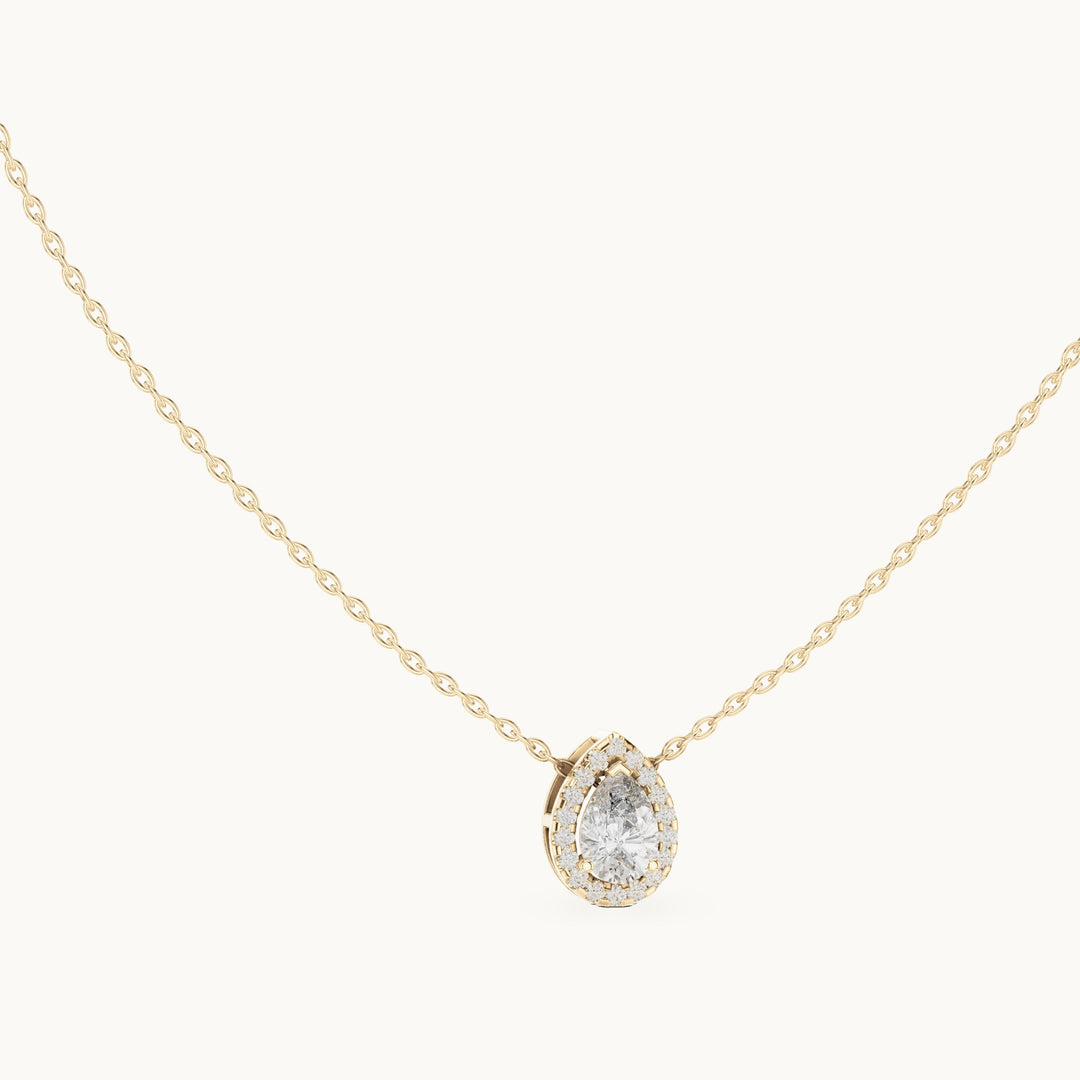 Pear lab-grown diamond framed halo pendant in yellow gold, 0.87 CT TW, view 1