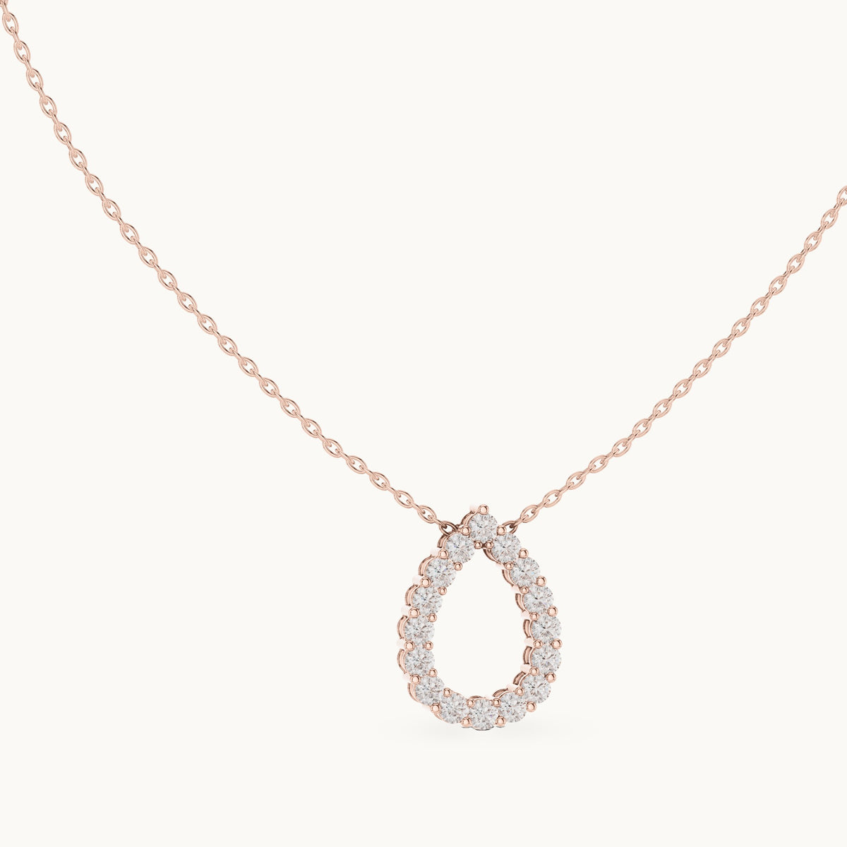 Round lab-grown diamond open teardrop pendant in rose gold, 1.04 CT TW, view 1