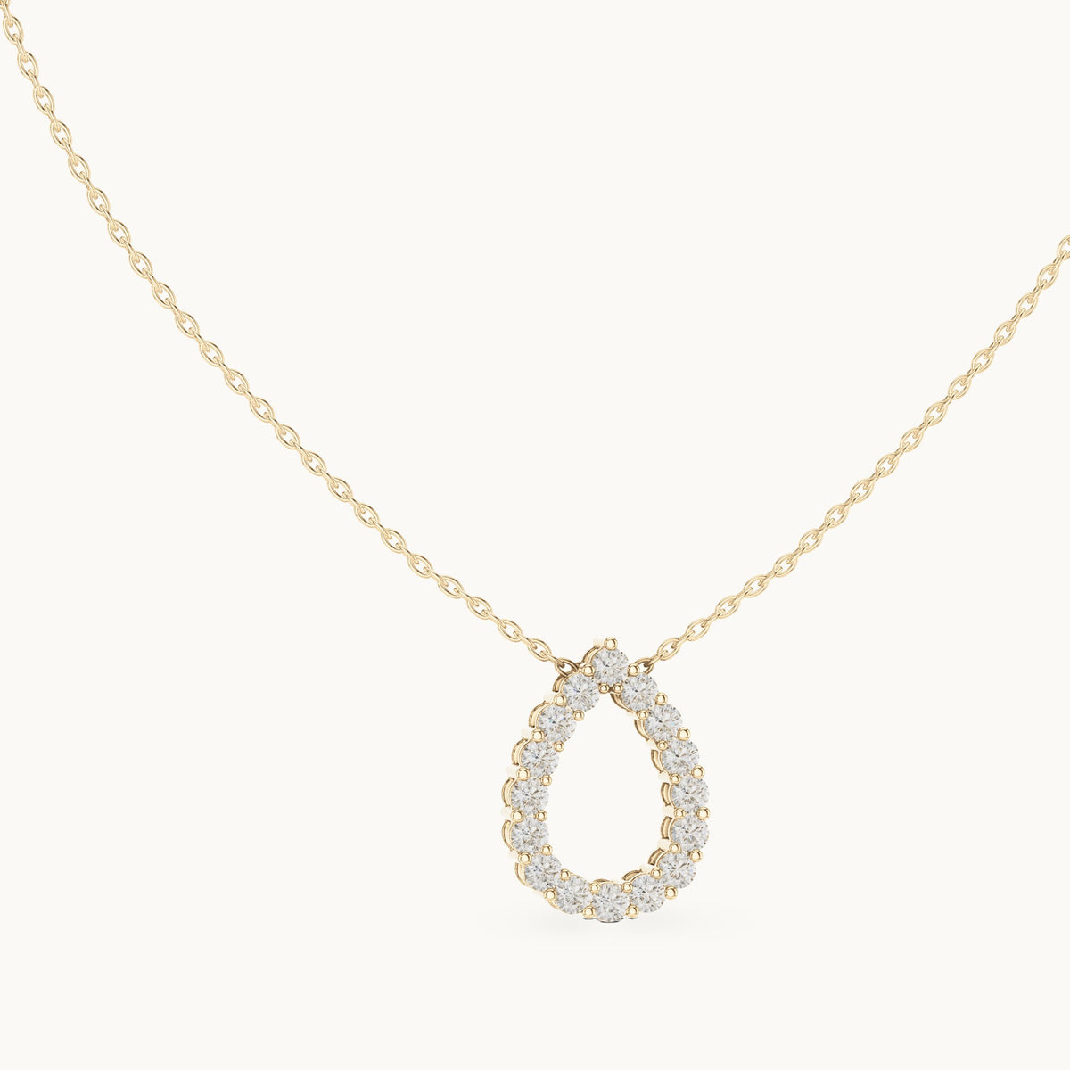 Round lab-grown diamond open teardrop pendant in yellow gold, 1.04 CT TW, view 1