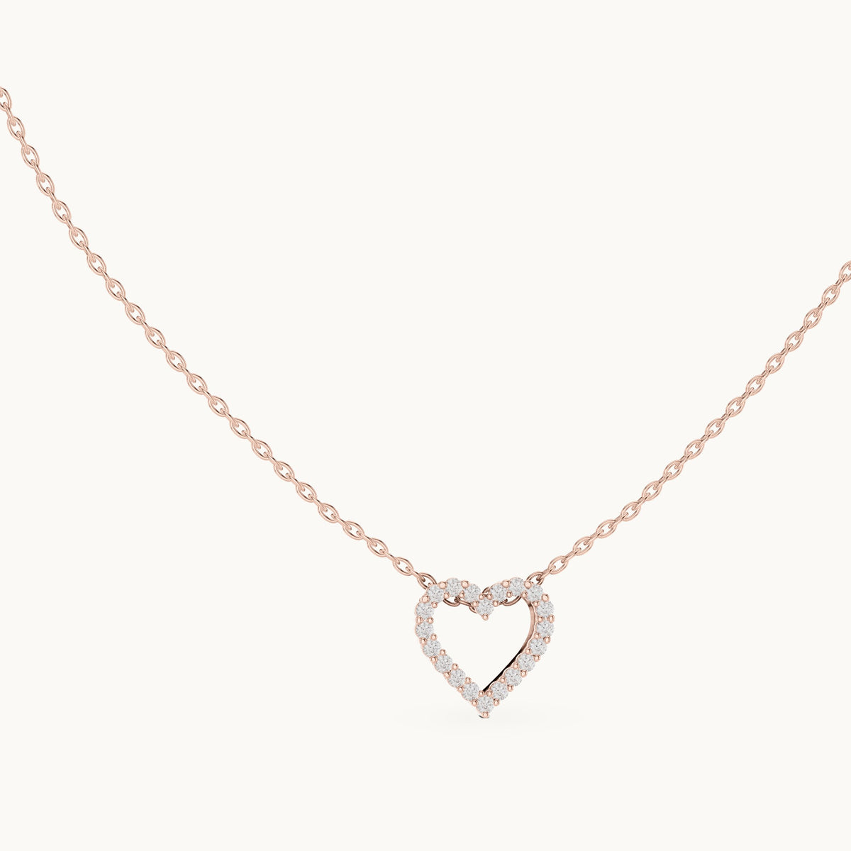 Round lab-grown diamond heart outline station pendant in rose gold, 0.24 CT TW, view 1