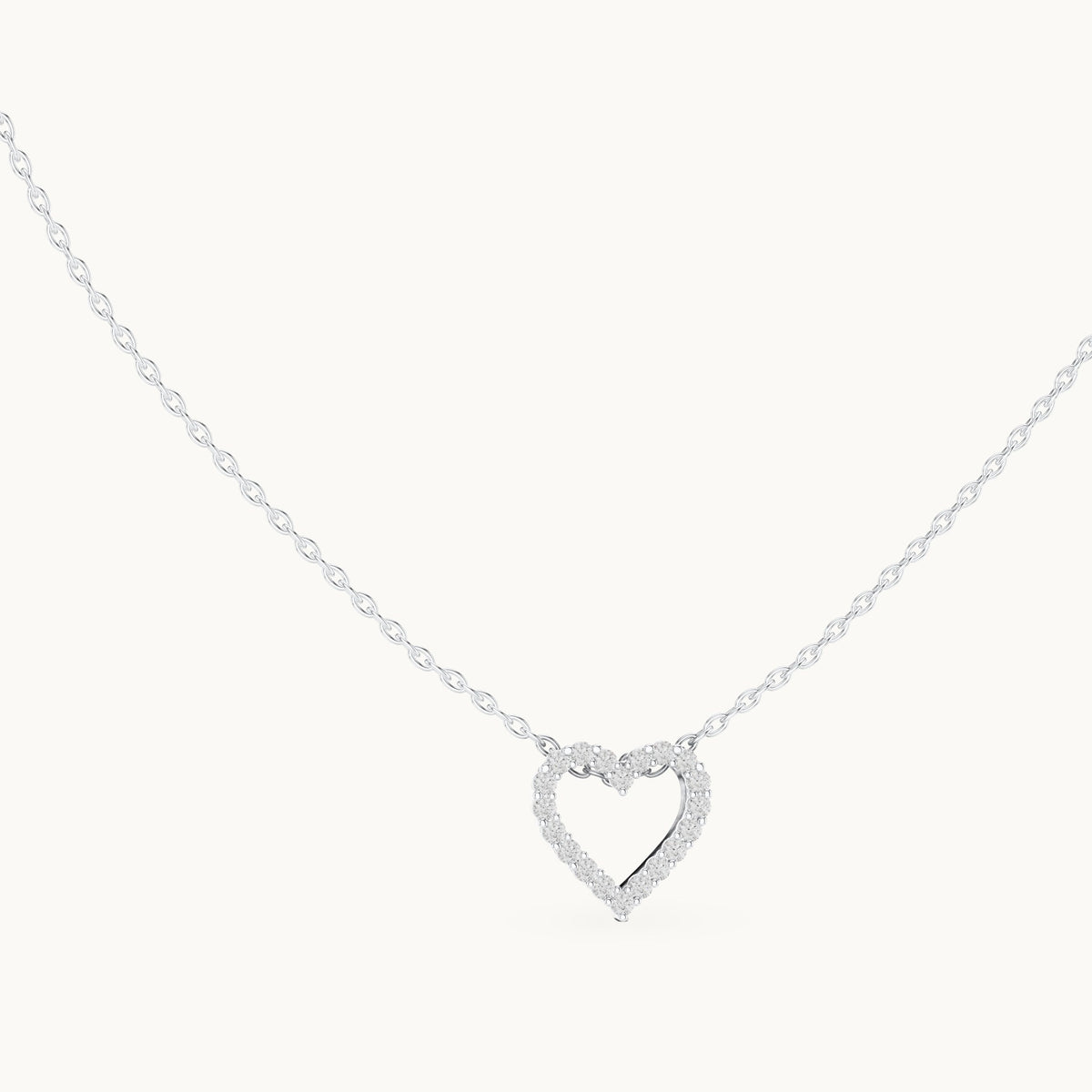 Round lab-grown diamond heart outline station pendant in white gold, 0.24 CT TW, view 1