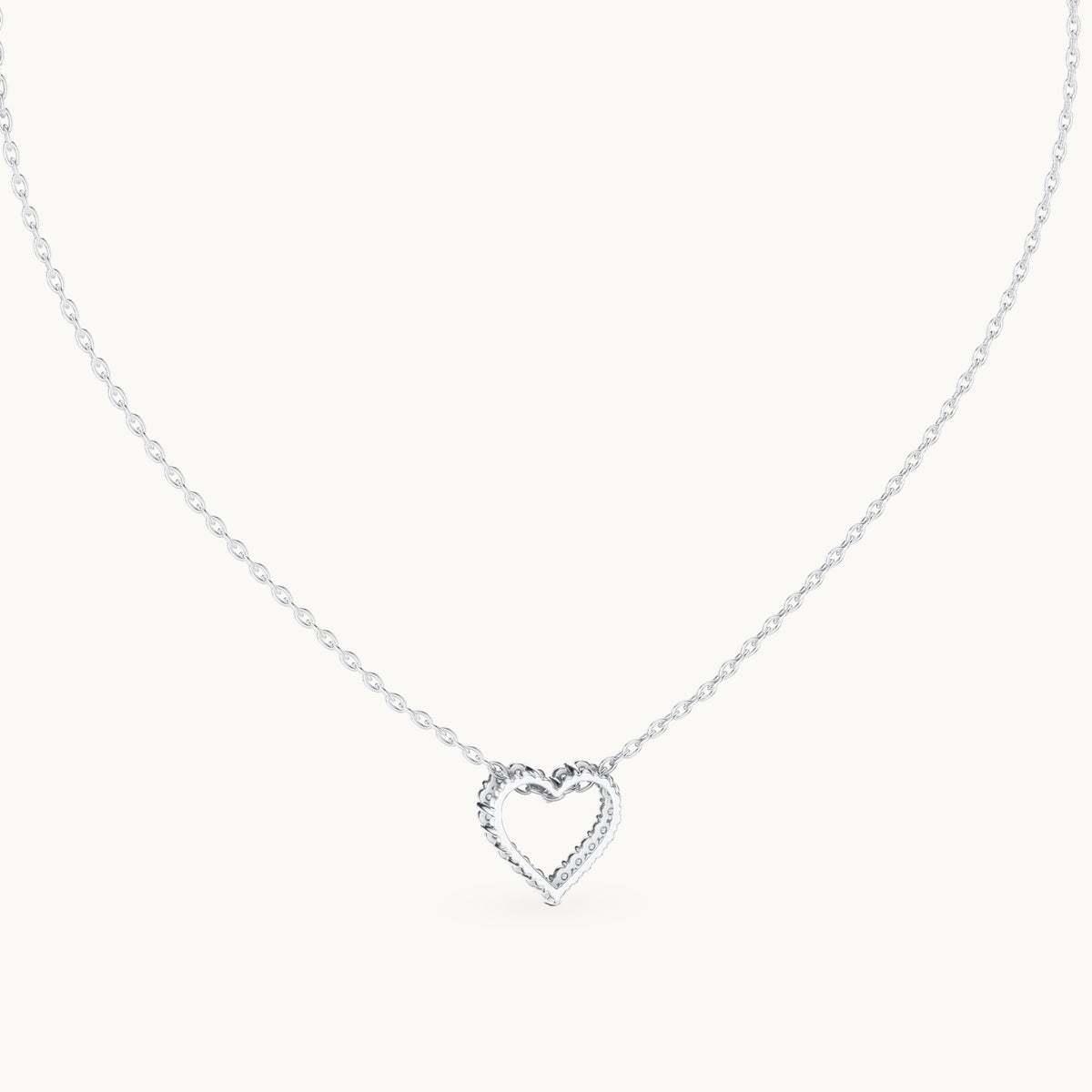 Round lab-grown diamond heart outline station pendant in white gold, 0.24 CT TW, view 4