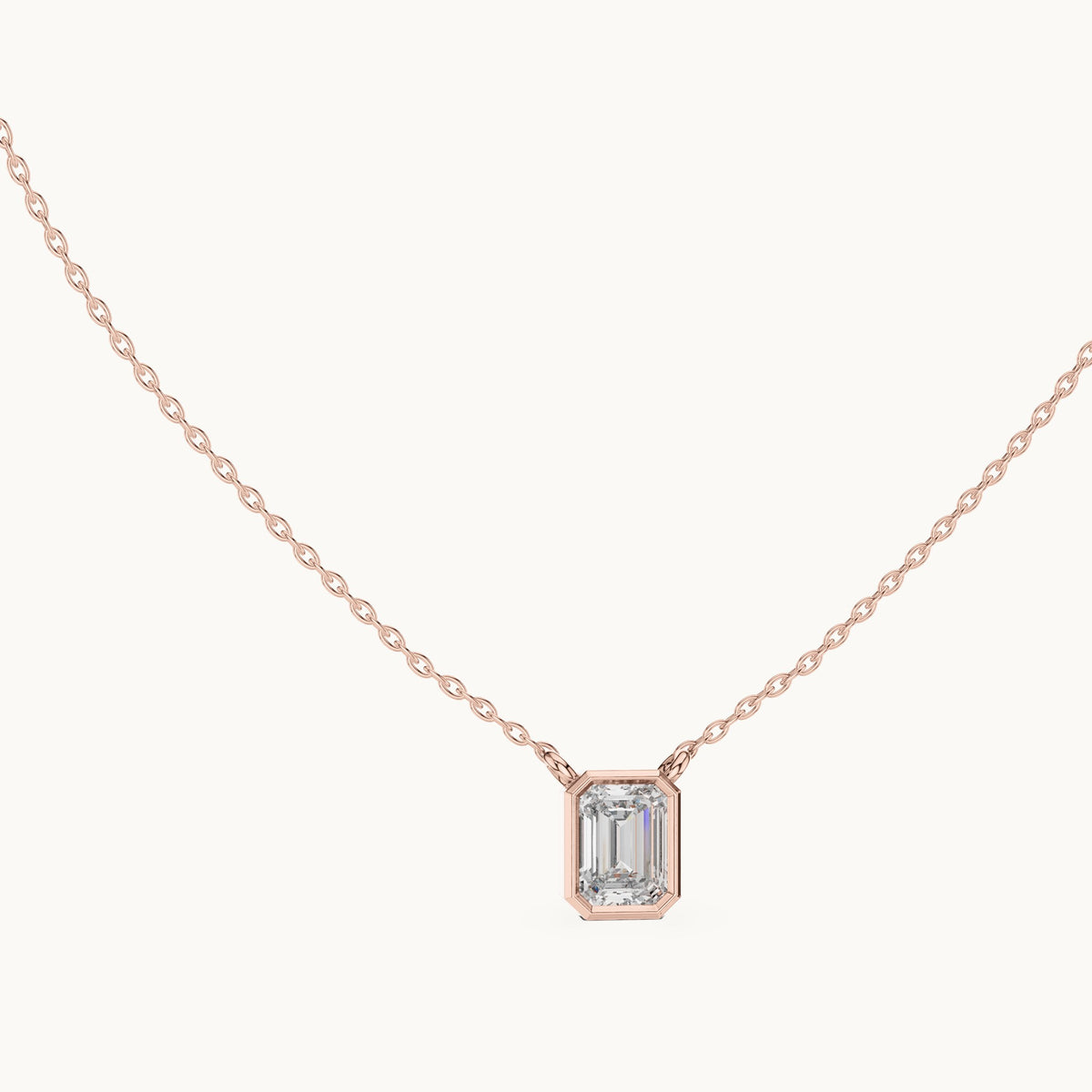 Emerald-cut lab-grown diamond bezel solitaire pendant in rose gold, 1.50 CT TW, view 1