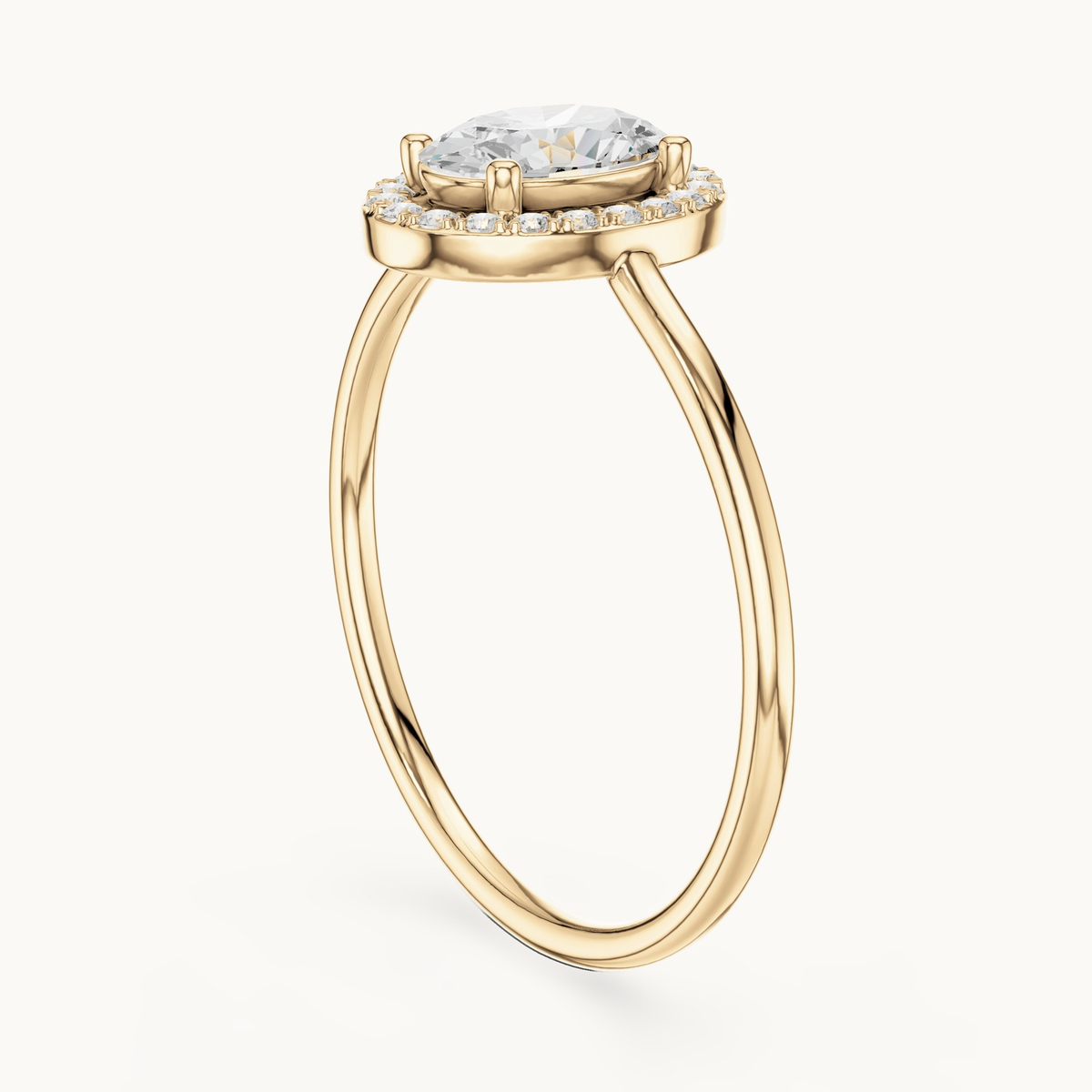 Oval lab-grown diamond halo engagement ring in 14K yellow gold, 0.60 CT TW, view 1