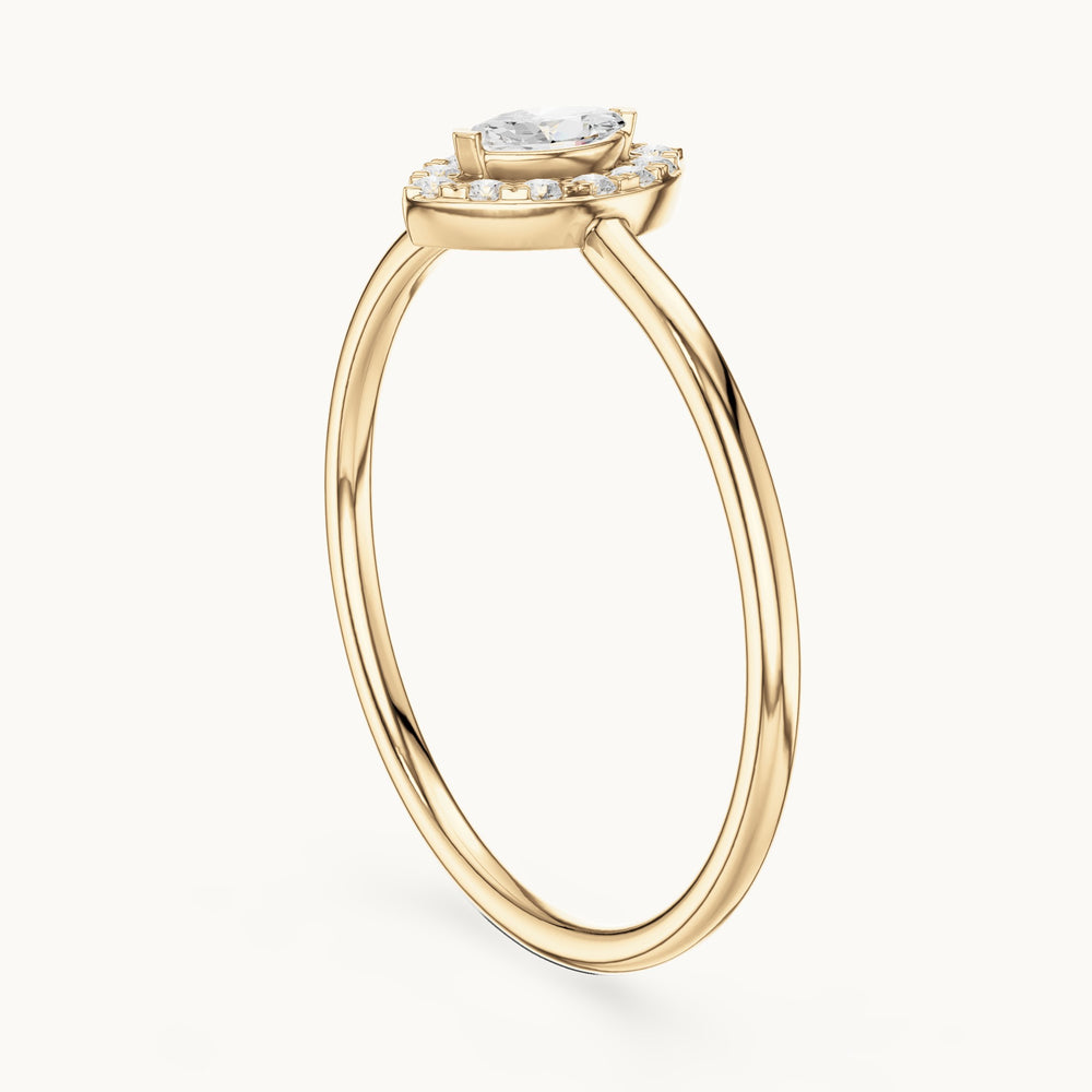 Marquise lab-grown diamond halo ring in yellow gold, 0.15 CT TW, view 1