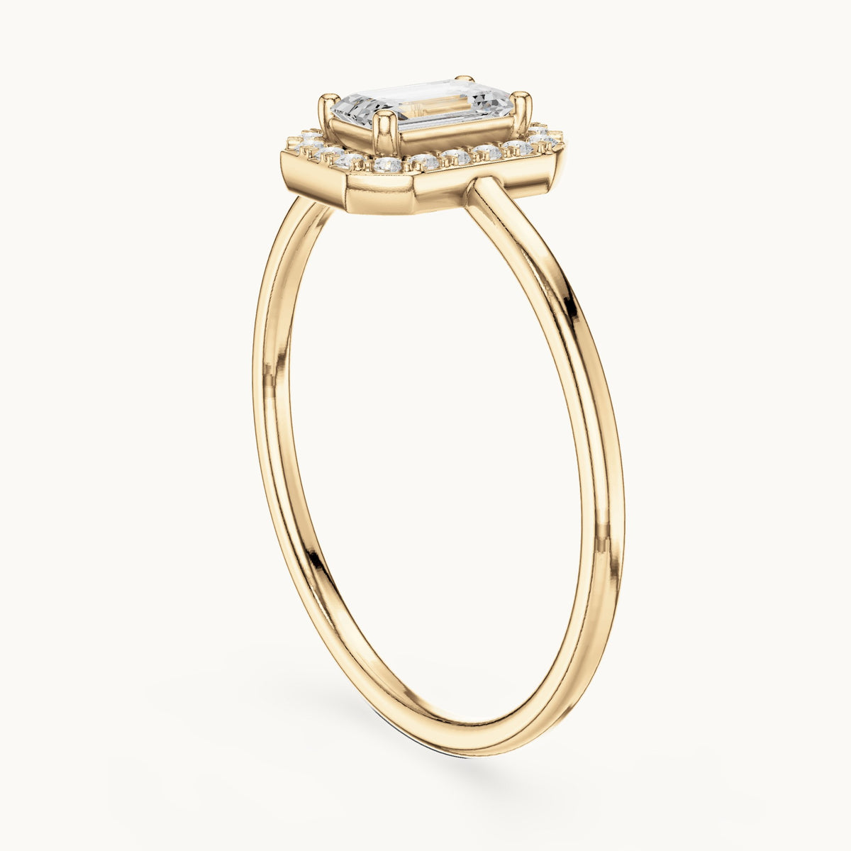 Emerald-cut lab-grown diamond petite halo engagement ring in yellow gold, 0.34 CT TW, view 1