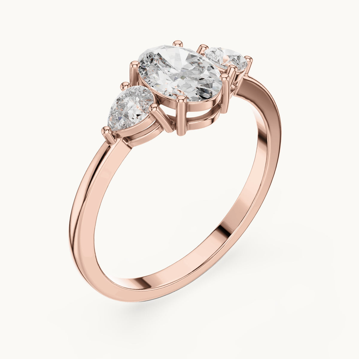Oval lab-grown diamond three-stone engagement ring with pear side stones in rose gold, 0.93 CT TW, view 2