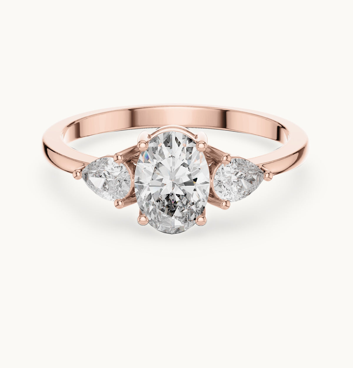 Oval lab-grown diamond three-stone engagement ring with pear side stones in rose gold, 0.93 CT TW, view 4