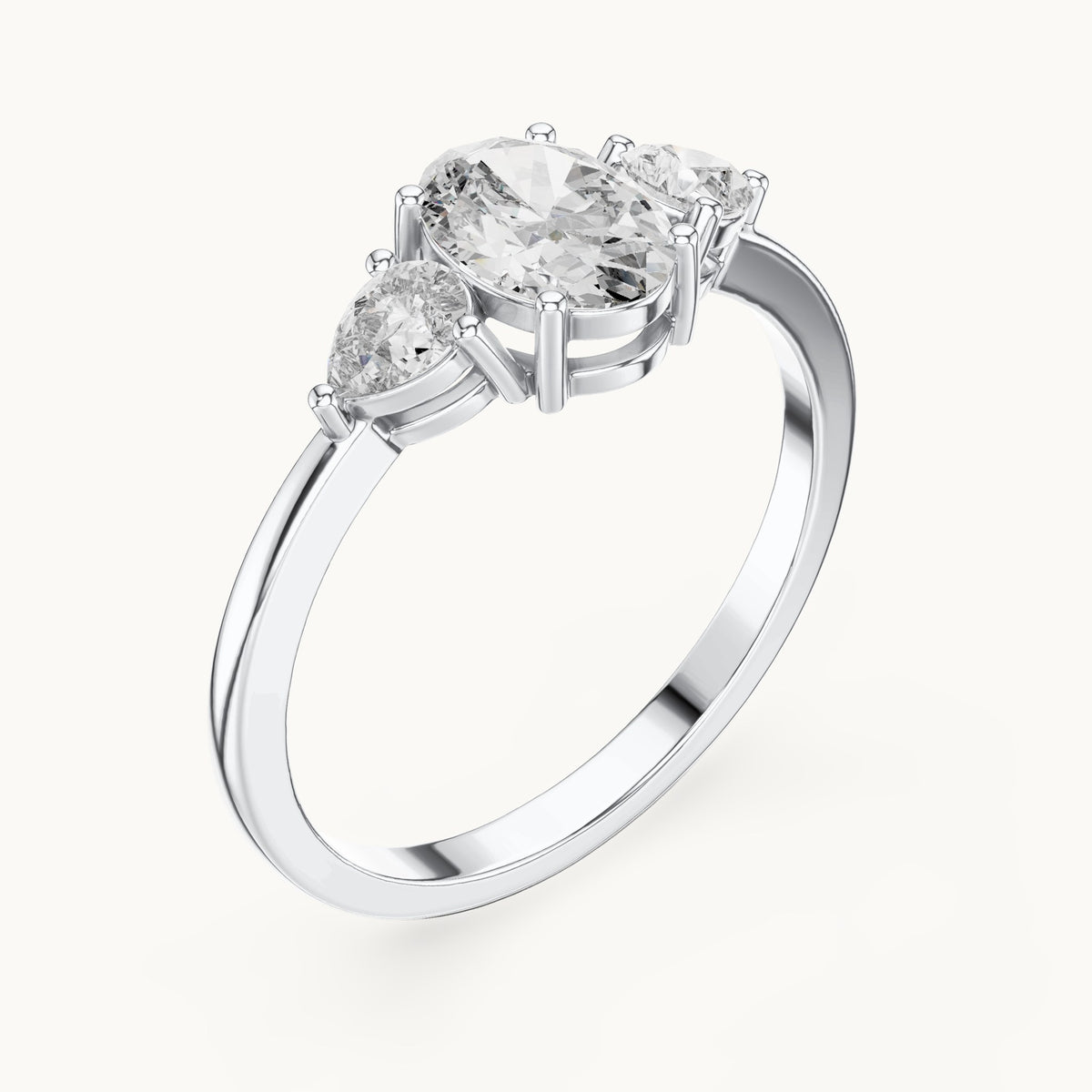 Oval lab-grown diamond three-stone engagement ring with pear side stones in white gold, 0.93 CT TW, view 2