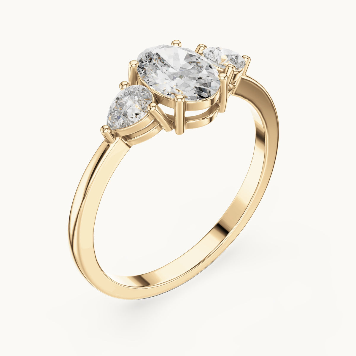 Oval lab-grown diamond three-stone engagement ring with pear side stones in yellow gold, 0.93 CT TW, view 2