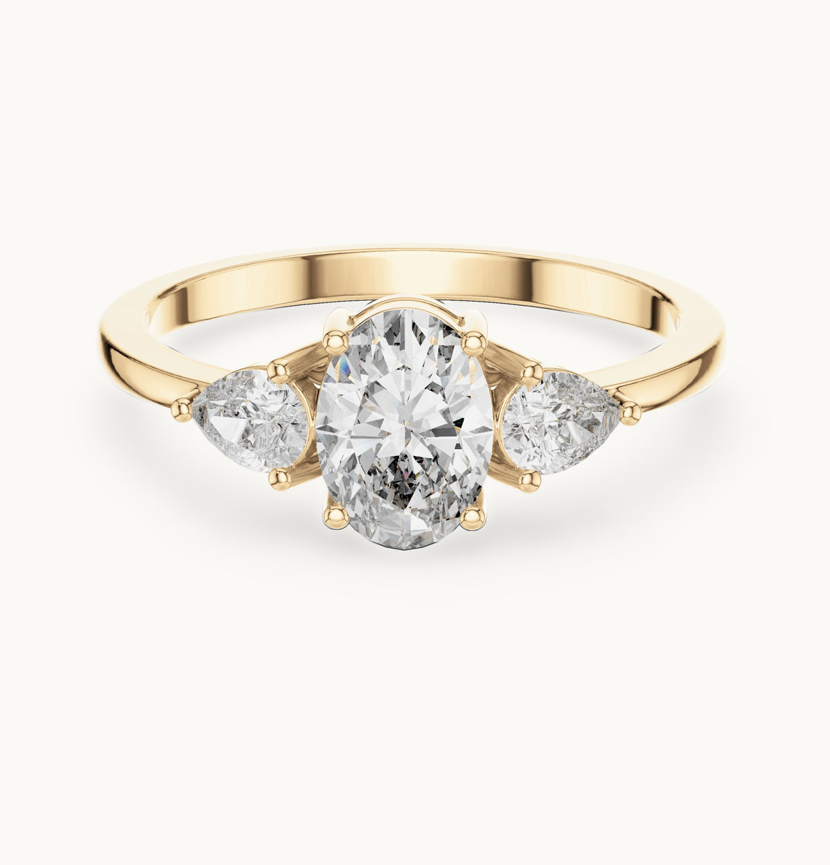 Oval lab-grown diamond three-stone engagement ring with pear side stones in yellow gold, 0.93 CT TW, view 4