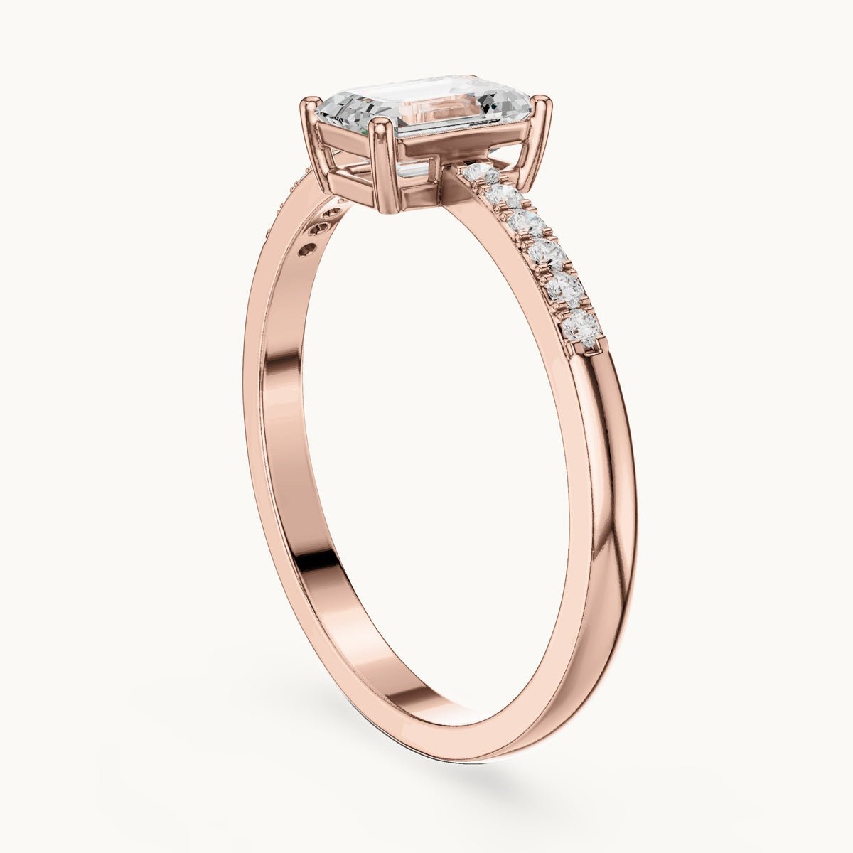Emerald-cut lab-grown diamond solitaire engagement ring with pavé band in rose gold, 0.62 CT TW, view 1