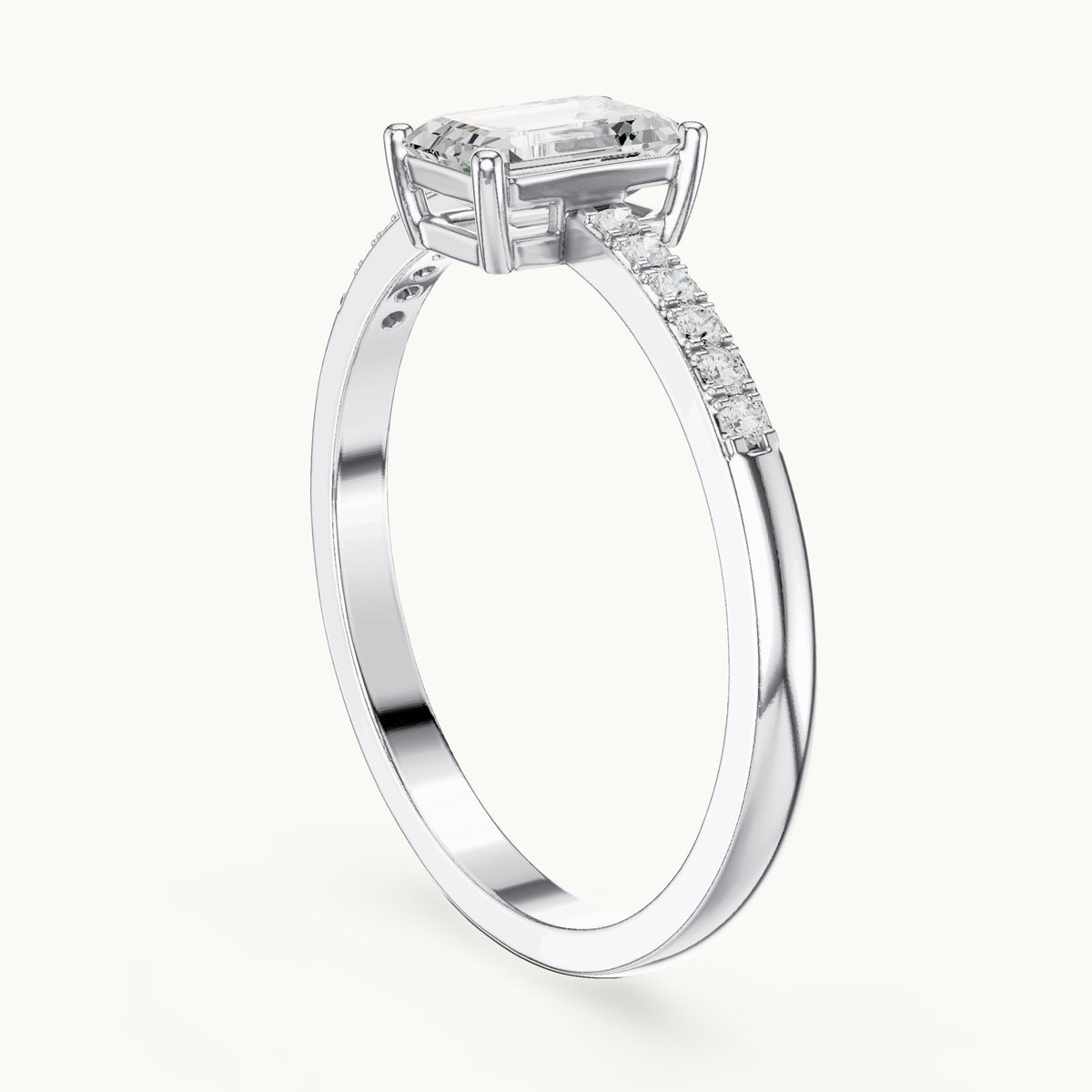 Emerald-cut lab-grown diamond solitaire engagement ring with pavé band in white gold, 0.62 CT TW, view 1