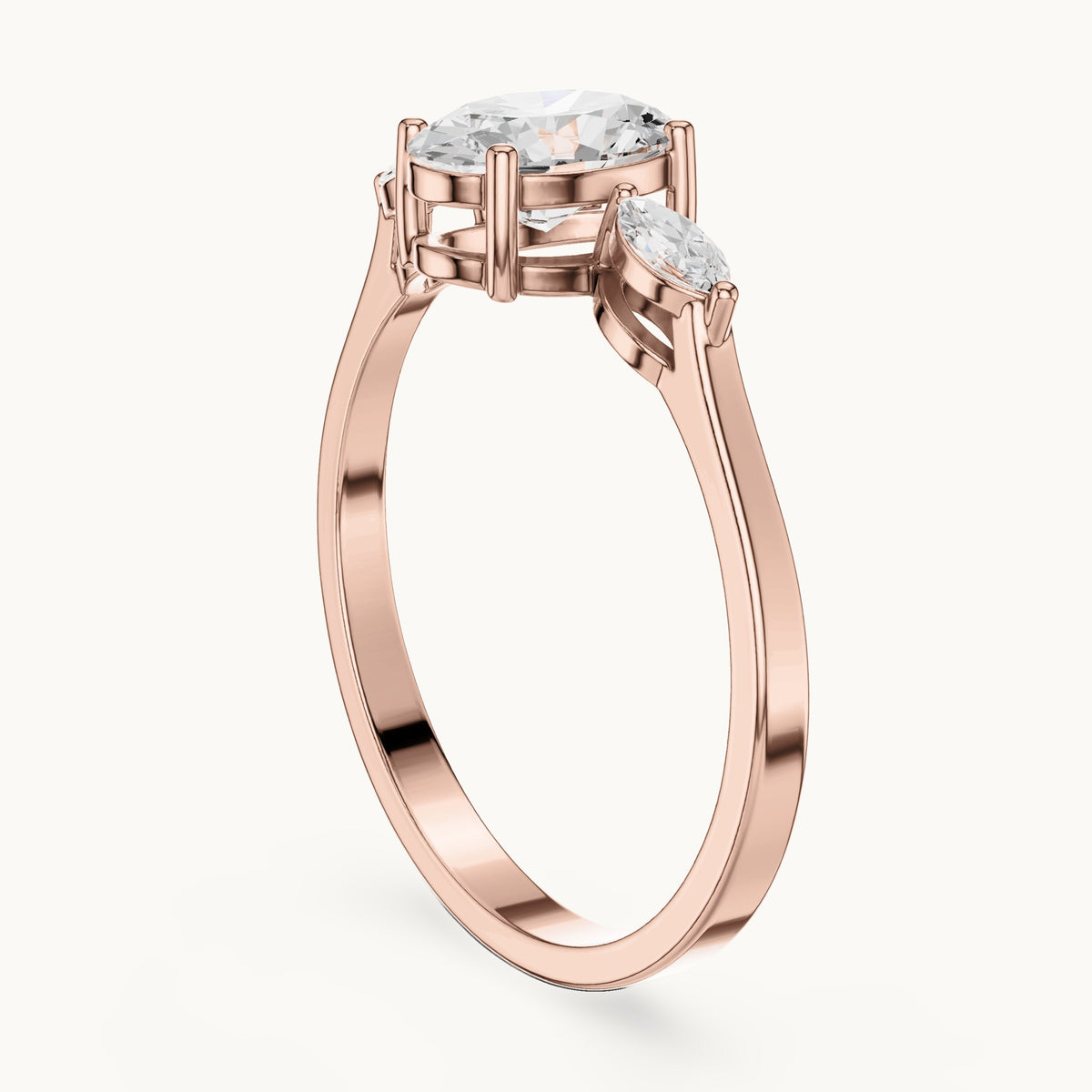 Oval lab-grown diamond three-stone engagement ring with marquise side stones in rose gold, 0.76 CT TW, view 1