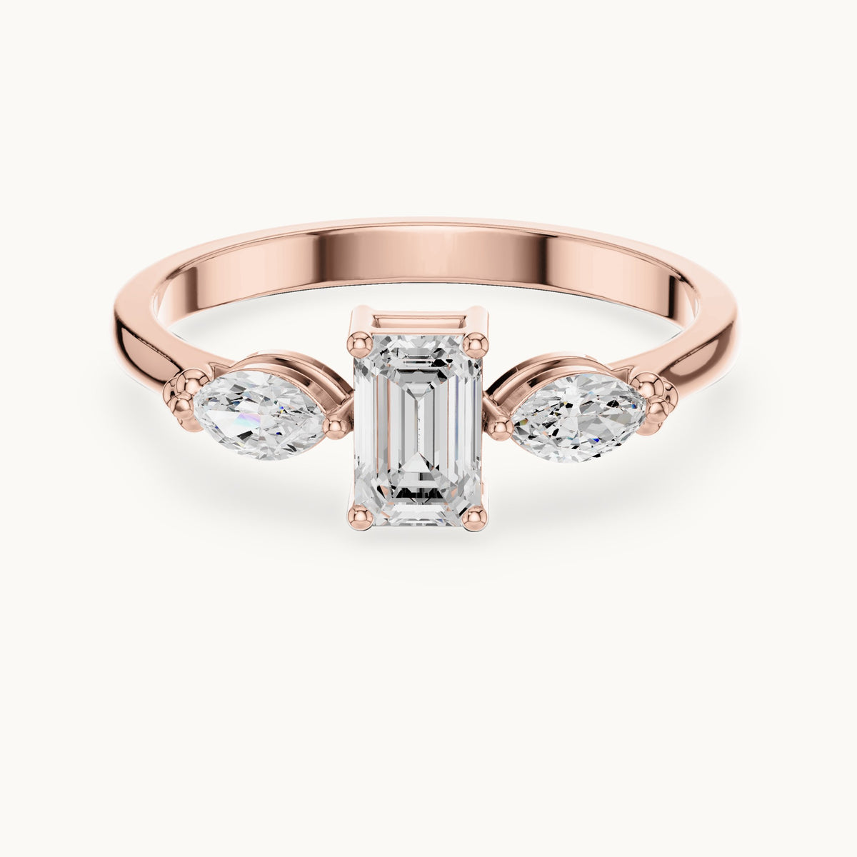 Emerald and marquise lab-grown diamond three-stone engagement ring with side stones in rose gold, 0.55 CT TW, view 4