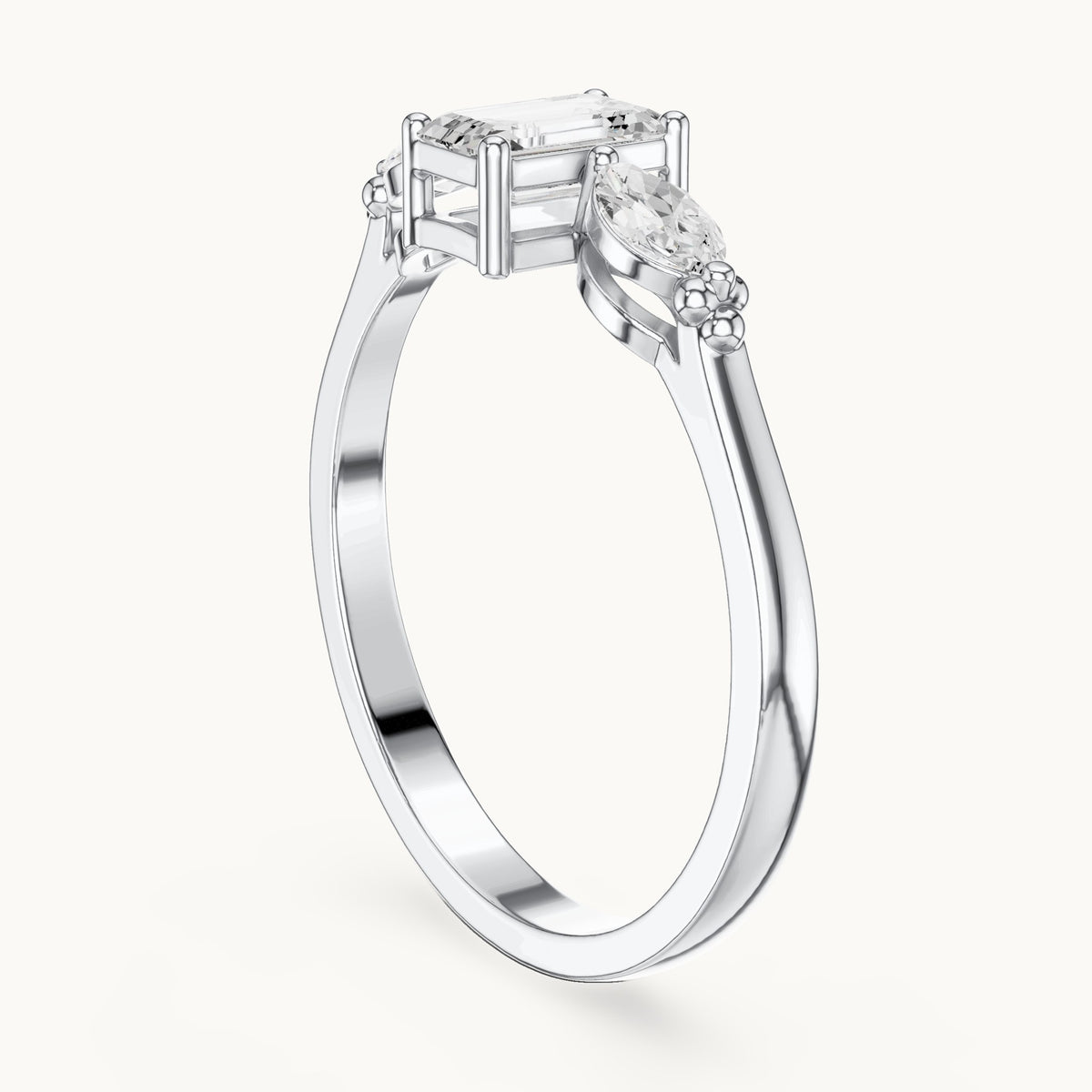 Emerald and marquise lab-grown diamond three-stone engagement ring with side stones in white gold, 0.55 CT TW, view 1