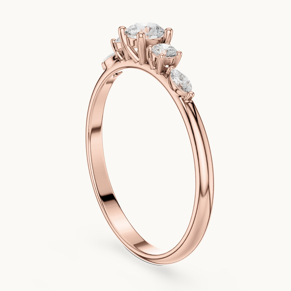 Round and marquise lab-grown diamond three-stone ring with marquise accents in rose gold, 0.299 CT TW, view 1