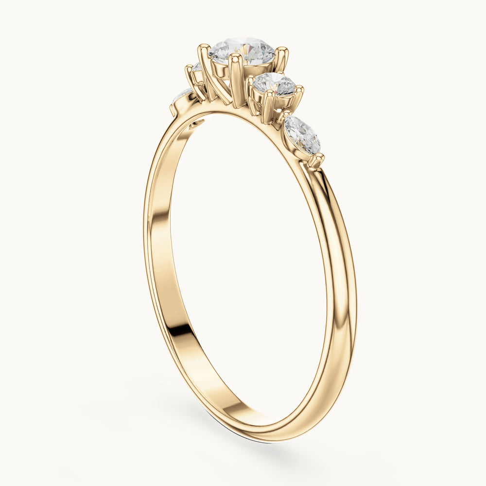 Round and marquise lab-grown diamond three-stone ring with marquise accents in yellow gold, 0.299 CT TW, view 1