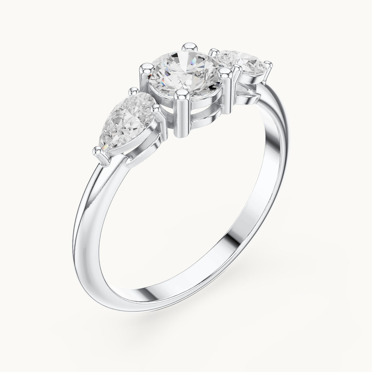 Round and pear lab-grown diamond three-stone engagement ring with side stones in white gold, 0.81 CT TW, view 2