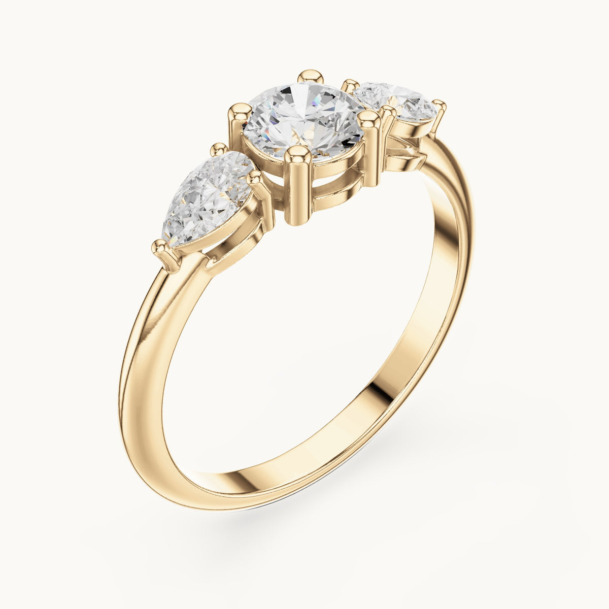 Round and pear lab-grown diamond three-stone engagement ring with side stones in yellow gold, 0.81 CT TW, view 2