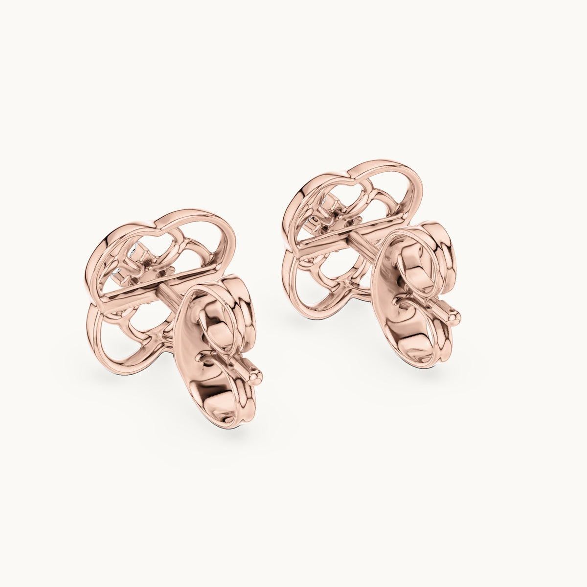 Round lab-grown diamond open quatrefoil stud earrings in rose gold, 0.032 CT TW, view 3