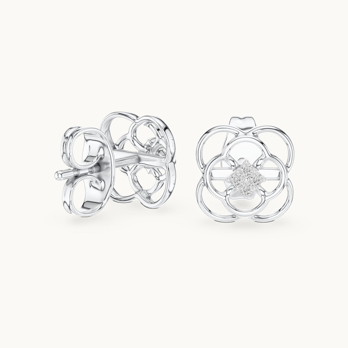 Round lab-grown diamond open quatrefoil stud earrings in white gold, 0.032 CT TW, view 1