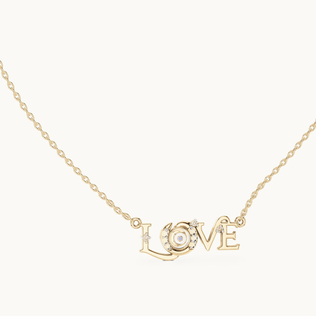 Round lab-grown diamond love script pendant in yellow gold, 0.094 CT TW, view 1