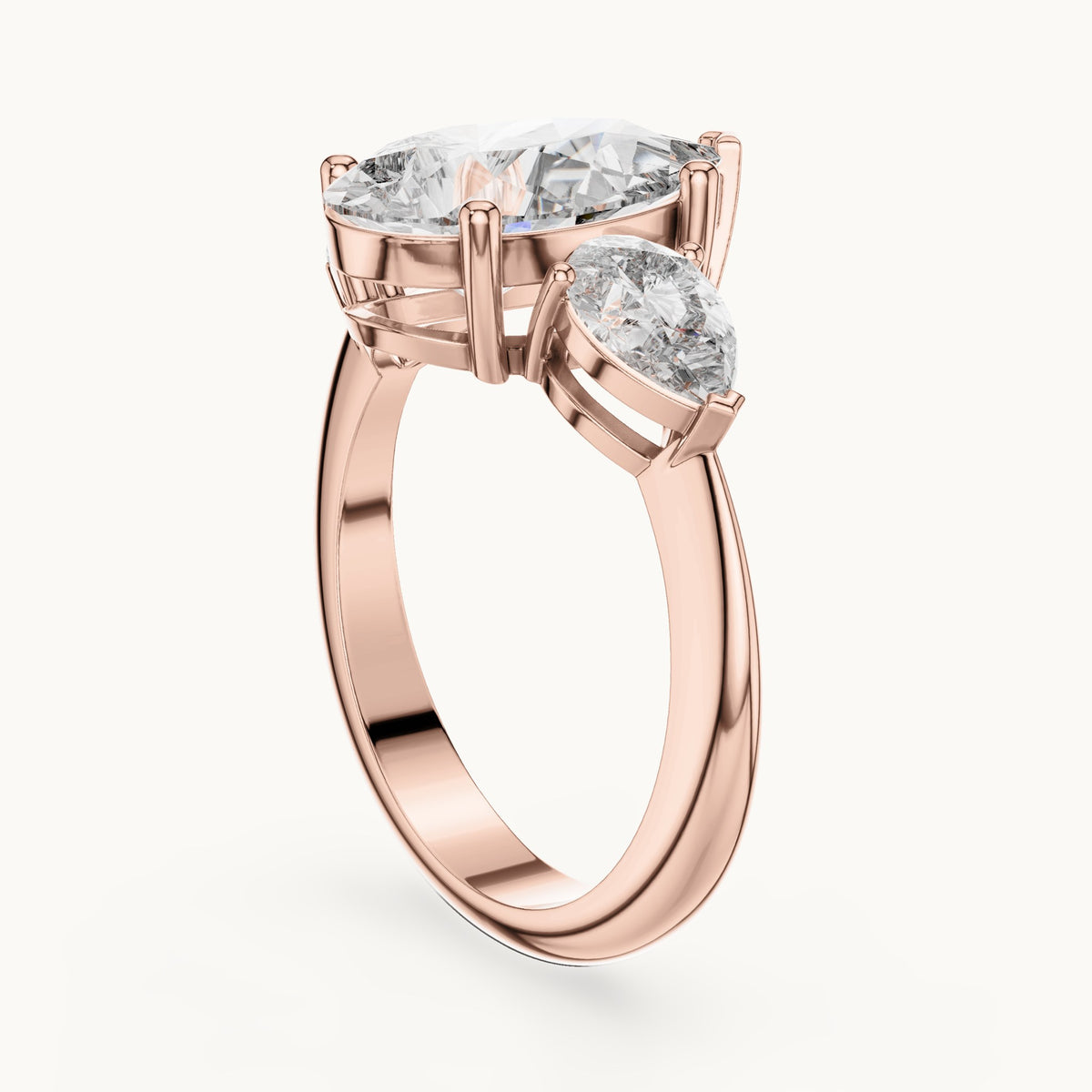 Pear lab-grown diamond three-stone engagement ring with pear side stones in rose gold, 4.00 CT TW, view 1