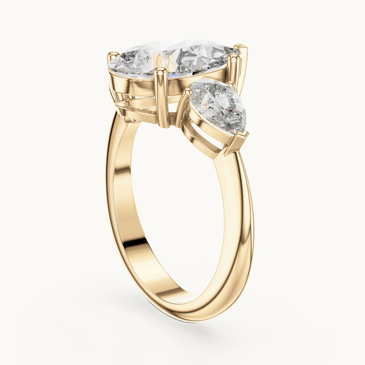Pear lab-grown diamond three-stone engagement ring with pear side stones in yellow gold, 4.00 CT TW, view 1
