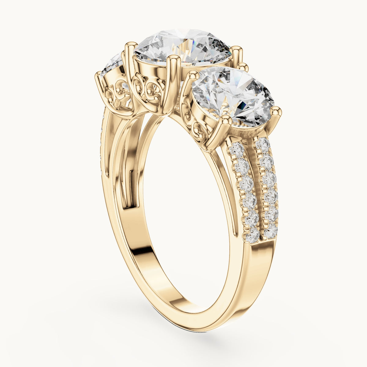 Round lab-grown diamond three-stone engagement ring with split pavé shank in yellow gold, 4.192 CT TW, view 1