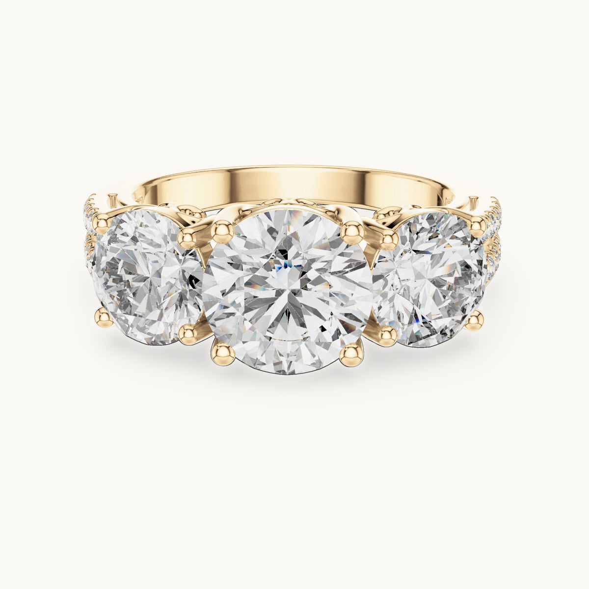 Round lab-grown diamond three-stone engagement ring with split pavé shank in yellow gold, 4.192 CT TW, view 4