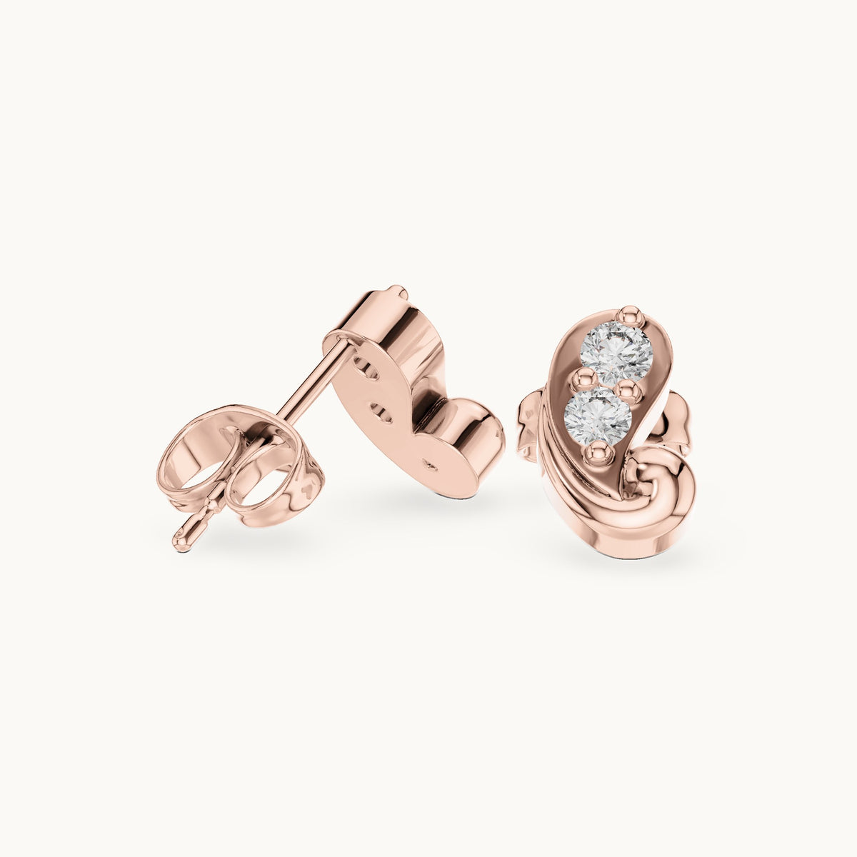 Round lab-grown diamond paisley two-stone stud earrings in rose gold, 0.23 CT TW, view 1