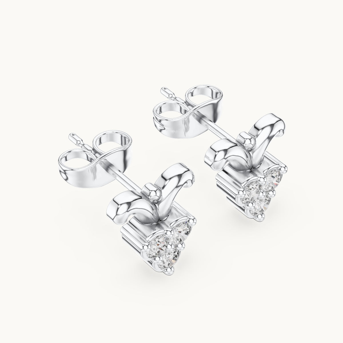 Round lab-grown diamond scroll trio cluster stud earrings in white gold, 0.30 CT TW, view 2
